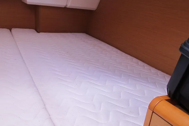 Slide: The Image of Interior cabin of 2013 Jeanneau Sun Odyssey 379 with white mattress. - 74