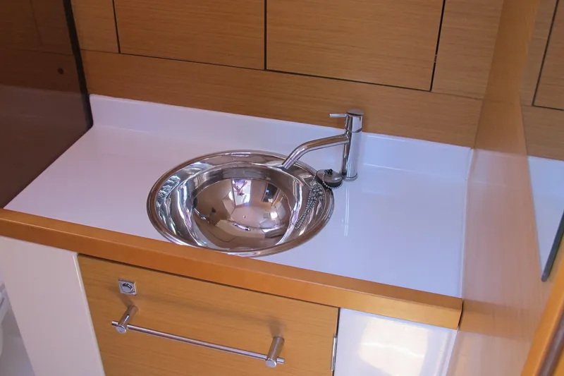 Slide: The Image of Stainless steel sink in 2013 Jeanneau Sun Odyssey 379 yacht galley. - 82