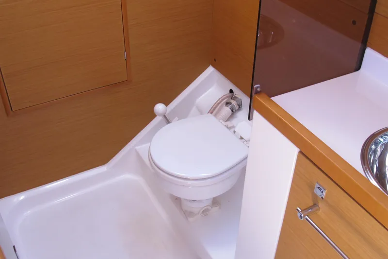 Slide: The Image of Interior of 2013 Jeanneau Sun Odyssey 379 yacht bathroom with toilet and sink. - 83
