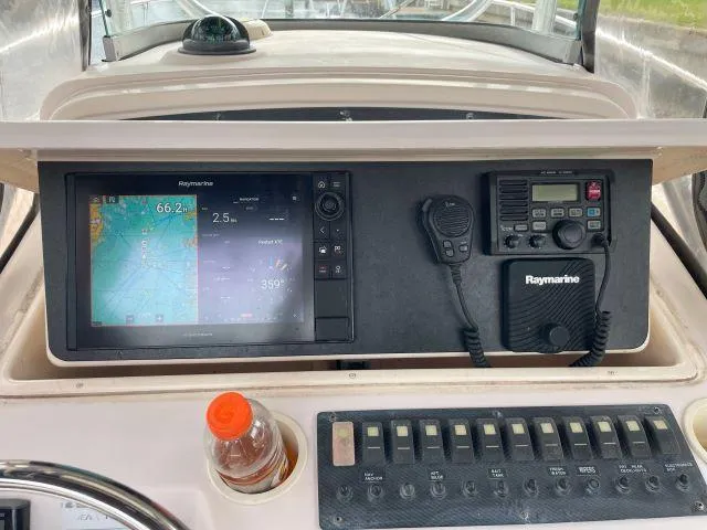 Slide: The Image of Control panel of 2005 Grady-White 283 RELEASE boat with Raymarine electronics. - 10