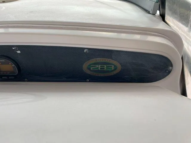 Slide: The Image of 2005 Grady-White 283 RELEASE boat dashboard with model emblem. - 12