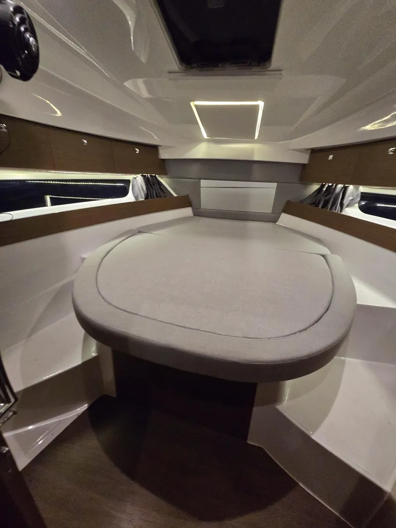 Slide: The Image of 2021 Jeanneau NC895 interior cabin with cozy bed and modern design. - 21
