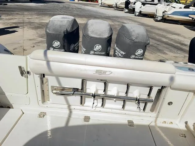 Slide: The Image of 2016 Boston Whaler 350 Outrage boat with Mercury engine covers, docked. - 20