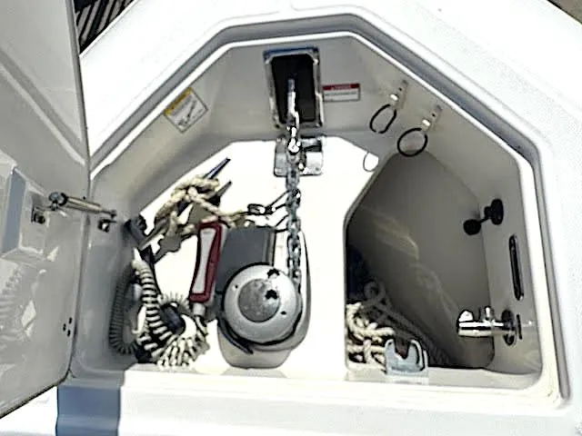Slide: The Image of 2016 Boston Whaler 350 Outrage anchor locker with ropes and chain. - 27