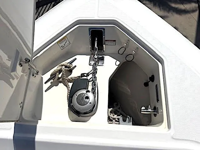 Slide: The Image of 2016 Boston Whaler 350 Outrage anchor locker with winch and ropes. - 28