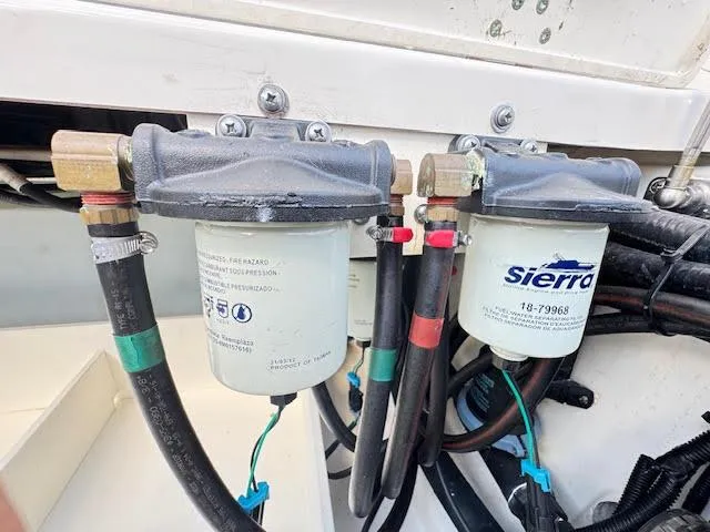 Slide: The Image of Fuel filters on a 2016 Boston Whaler 350 Outrage boat engine. - 49
