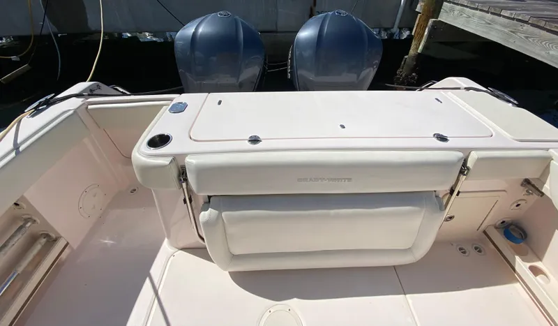 Slide: The Image of 2016 Grady-White Canyon 306 boat deck with dual outboard motors. - 9