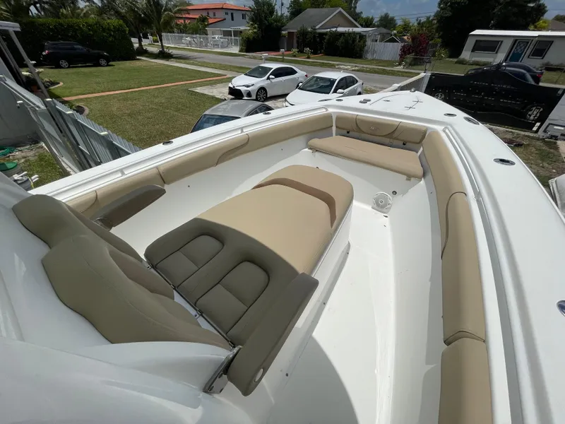 Slide: The Image of 2017 Sea Hunt Gamefish 27 with Coffin Box, featuring spacious seating and sleek design. - 7