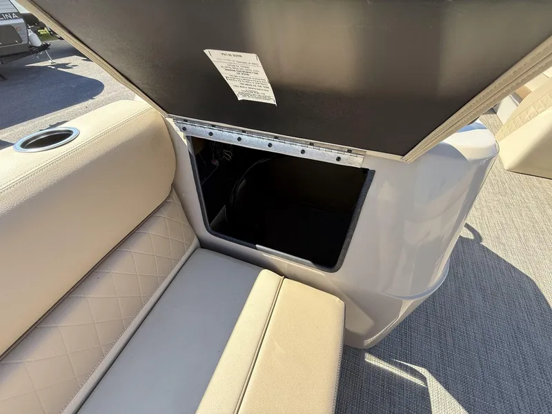 Slide: The Image of Veranda Vista View Series 2025 boat seat with open storage compartment. - 6