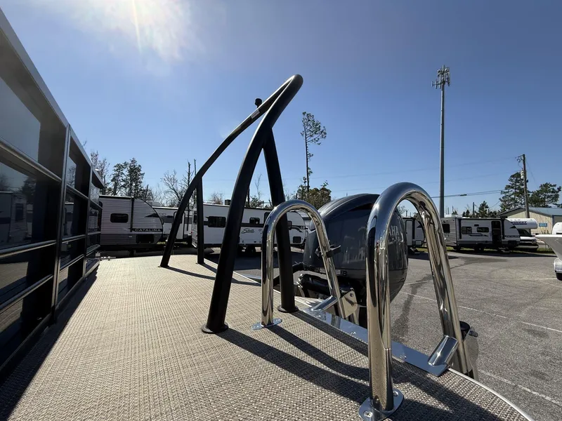 Slide: The Image of 2025 Veranda Vista View Series boat with sleek design and chrome details under clear sky. - 9