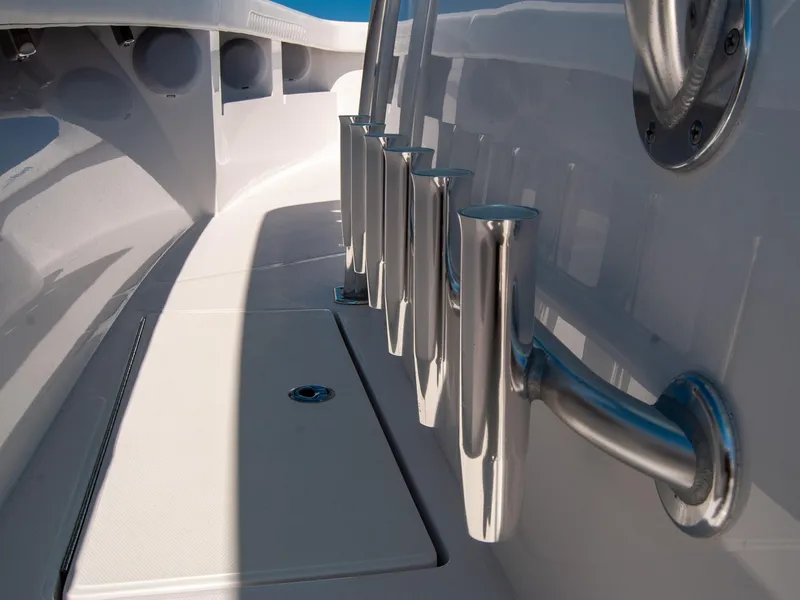 Slide: The Image of 2025 Front Runner 36 Center Console boat with stainless steel rod holders. - 12