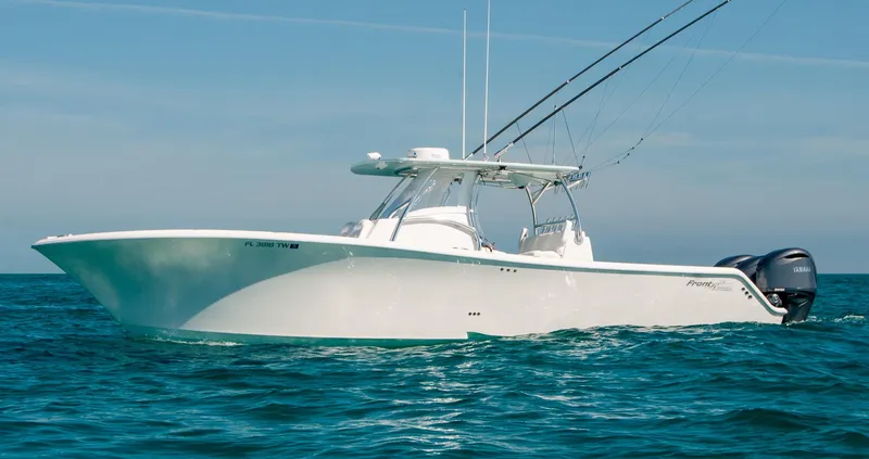 Slide: The Image of 2025 Front Runner 36 Center Console boat on open water. - 16