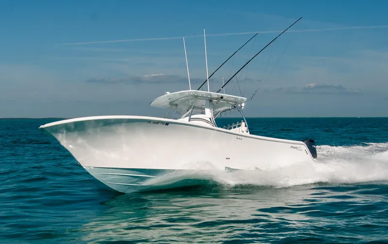 Slide: The Image of 2025 Front Runner 36 Center Console boat cruising on open water. - 20