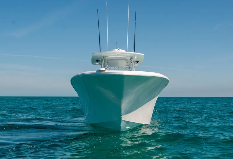 Slide: The Image of 2025 Front Runner 36 Center Console boat on open sea, clear blue sky. - 24
