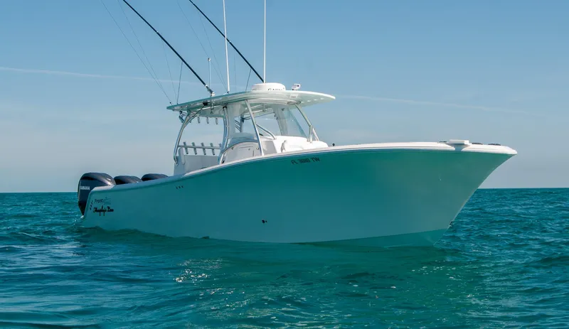 Slide: The Image of 2025 Front Runner 36 Center Console boat on open water. - 25