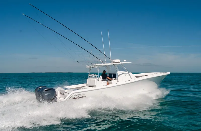 Slide: The Image of 2025 Front Runner 36 Center Console boat cruising on open water. - 27