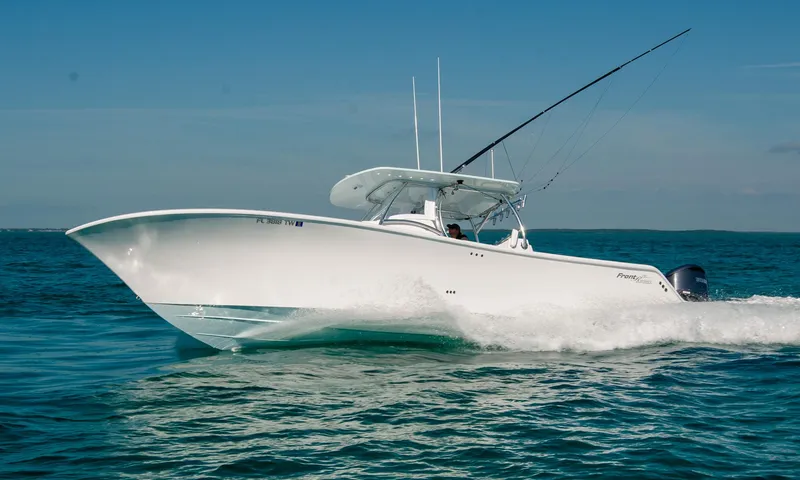 Slide: The Image of 2025 Front Runner 36 Center Console boat cruising on open water. - 32