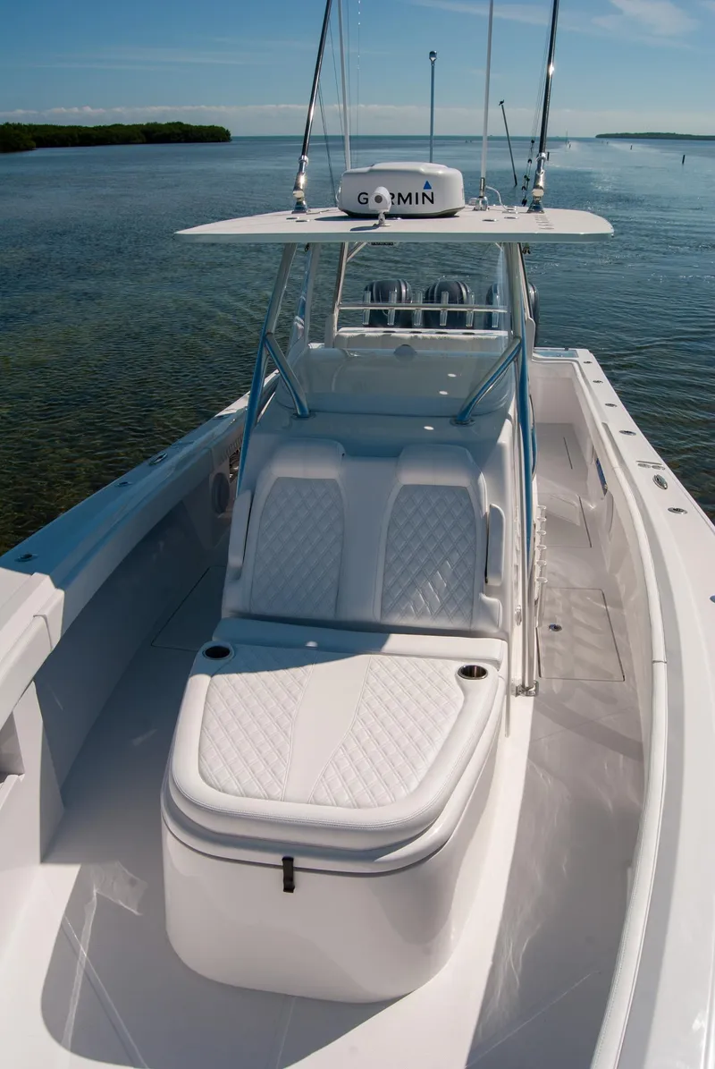 Slide: The Image of 2025 Front Runner 36 Center Console boat on calm water, featuring sleek design and advanced technology. - 7