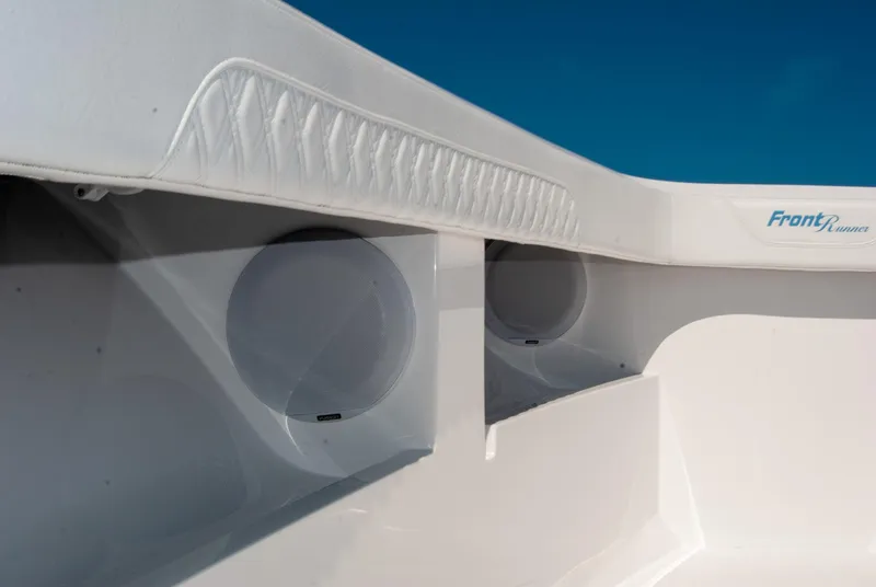 Slide: The Image of 2025 Front Runner 36 Center Console boat interior with speakers and cushioned detailing. - 8
