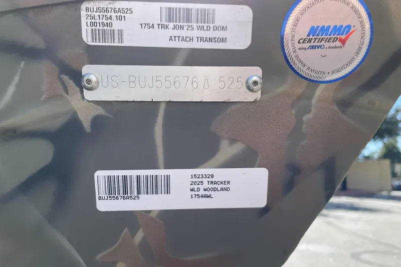 Slide: The Image of 2025 Tracker Grizzly 1754 Jon boat identification labels and certification sticker. - 25