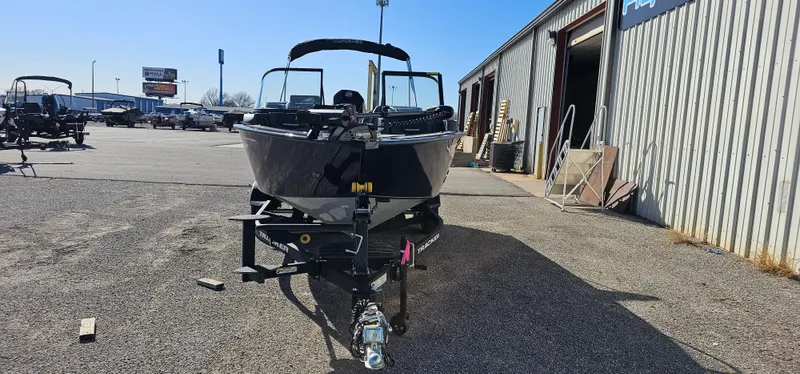 Slide: The Image of 2025 Tracker Targa V-19 WT boat on trailer in outdoor lot. - 2