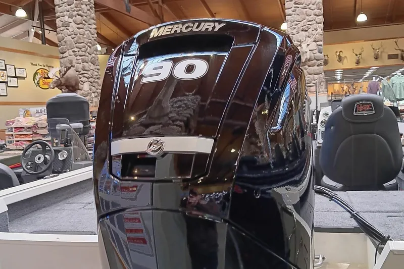 Slide: The Image of 2025 Ranger VS1682SC Reata with Mercury 90 engine in showroom. - 2