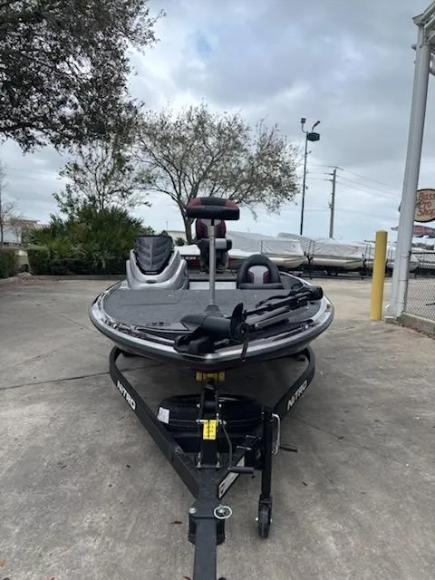 Slide: The Image of 2025 Nitro Z17 boat on trailer, parked outdoors, cloudy sky background. - 4