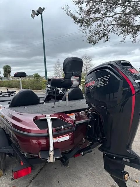 Slide: The Image of 2025 Nitro Z17 boat with powerful engine, parked outdoors under cloudy sky. - 5