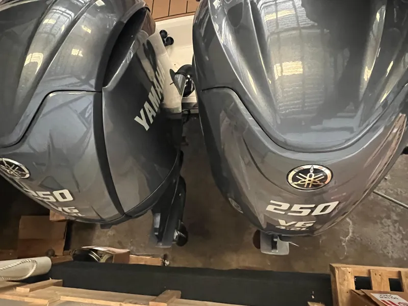 Slide: The Image of Twin Yamaha 250 V6 outboard engines on a 2023 Chaparral 280 OSX boat. - 2