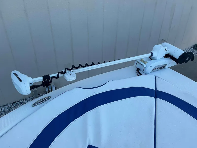 Slide: The Image of 2017 Epic 25 SC boat with Minn Kota trolling motor attached. - 12