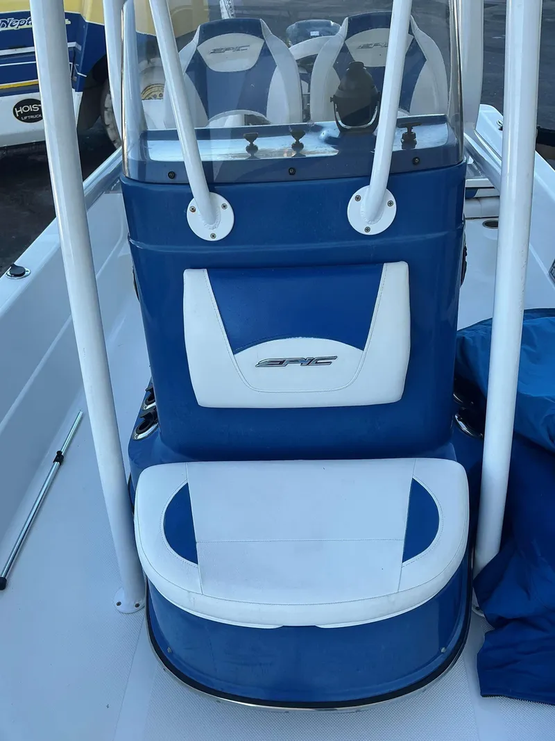 Slide: The Image of 2017 Epic 25 SC boat interior with blue and white seating. - 13