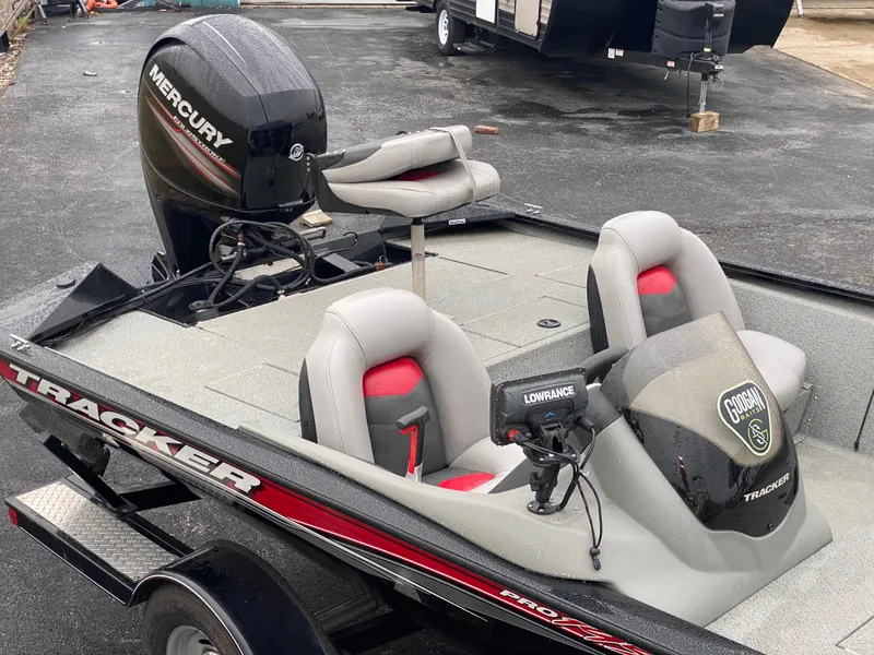 Slide: The Image of 2016 Tracker Pro Team 195 TXW boat with Mercury engine and fishing seats. - 17