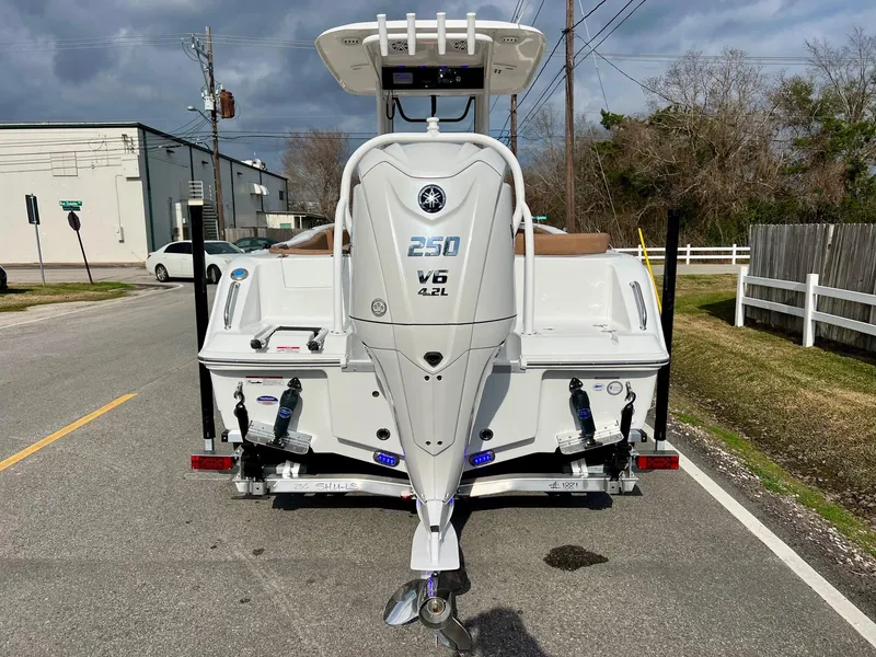 Slide: The Image of 2025 Sea Hunt Ultra 235 SE boat with V6 engine on a trailer. - 3
