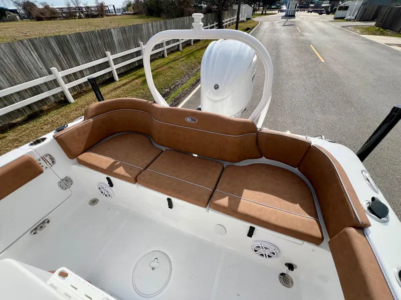 Slide: The Image of 2025 Sea Hunt Ultra 235 SE boat with spacious seating and modern design. - 7