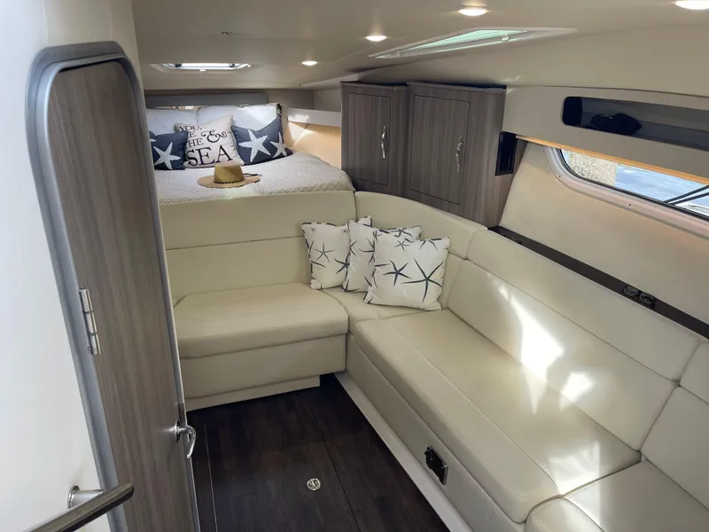 Slide: The Image of Luxurious interior of 2021 Regal 35 Sport Coupe with cozy seating and elegant decor. - 34