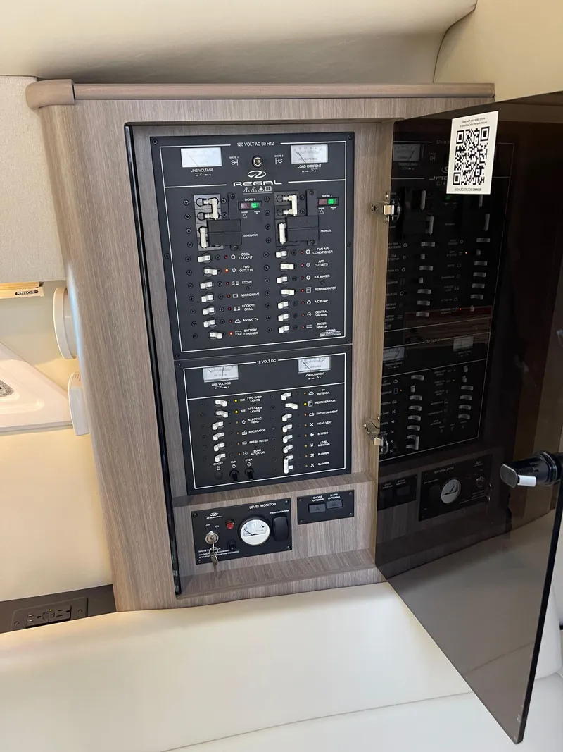 Slide: The Image of Electrical panel inside a 2021 Regal 35 Sport Coupe boat. - 36