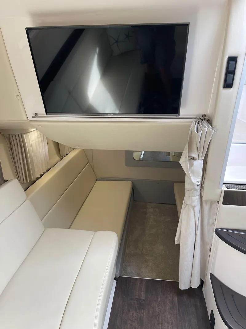 Slide: The Image of Interior of 2021 Regal 35 Sport Coupe with TV and seating area. - 41