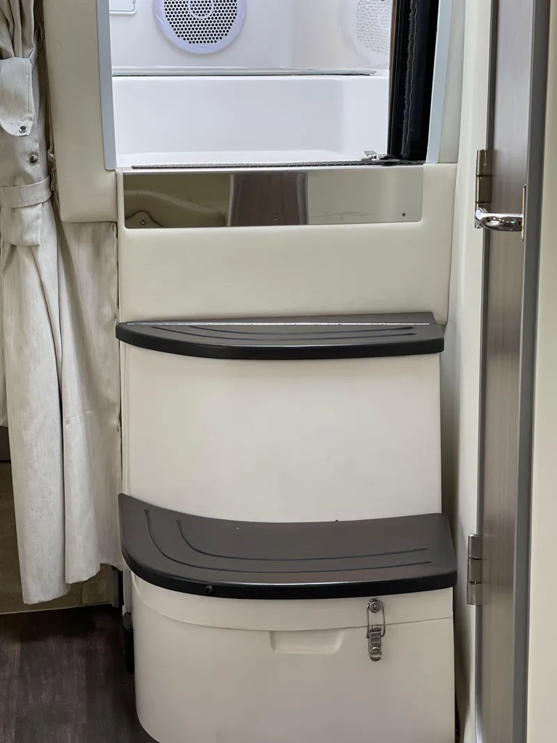 Slide: The Image of Interior steps of 2021 Regal 35 Sport Coupe boat, featuring sleek design and modern materials. - 46