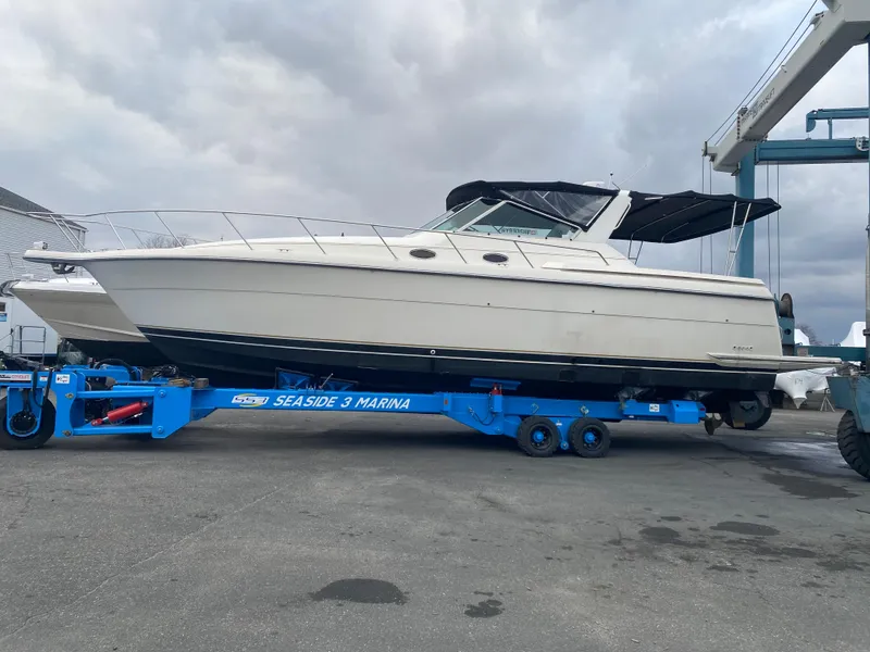 Slide: The Image of 1997 Tiara Yachts 4000 Express on trailer at Seaside Marina, ready for launch. - 4