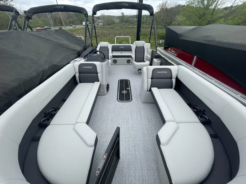 Slide: The Image of 2025 Harris Cruiser 230 pontoon boat interior with spacious seating and modern design. - 13