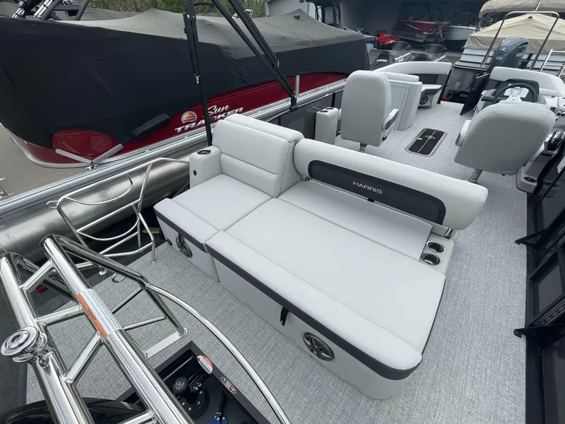 Slide: The Image of 2025 Harris Cruiser 230 interior with sleek seating and modern design. - 9