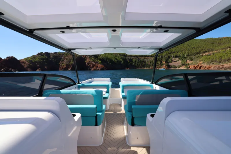 Slide: The Image of Interior view of 2025 Canados Heritage 36 yacht with scenic ocean backdrop. - 12