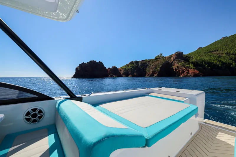 Slide: The Image of Luxury Canados Heritage 36 yacht with scenic ocean and rocky island view, 2025 model. - 14