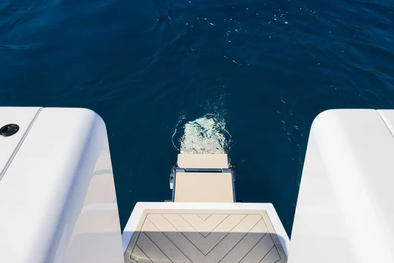 Slide: The Image of Canados Heritage 36 yacht swim platform, 2025 model, on clear blue water. - 18
