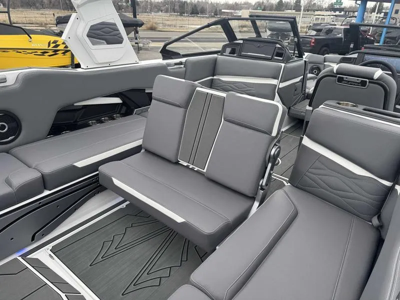 Slide: The Image of 2025 Supra SL boat interior with sleek gray seating and modern design. - 17
