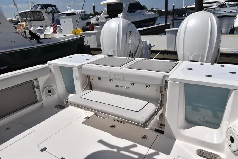 Slide: The Image of 2021 Sea Fox 368 boat deck with seating and twin outboard engines. - 11