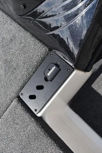 Slide: The Image of 2025 Triton 19 TrX Patriot boat interior detail with black mounting bracket. - 16