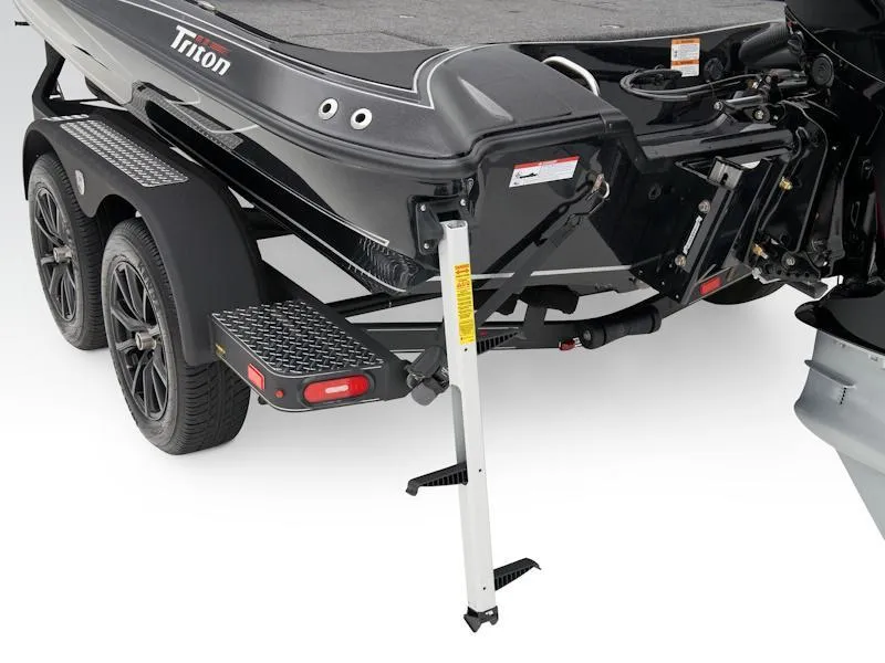 Slide: The Image of 2025 Triton 19 TrX Patriot boat trailer with step ladder and dual wheels. - 33