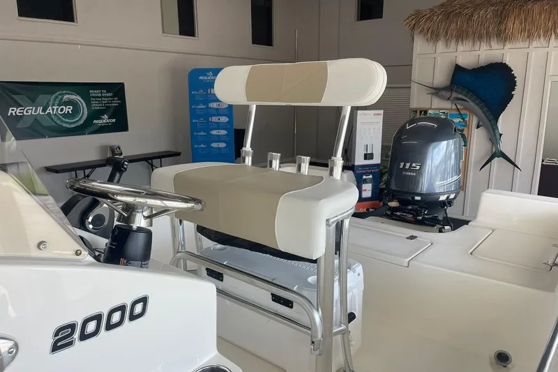 Slide: The Image of Bulls Bay 2000 boat interior with Yamaha 115 engine, 2025 model. - 8