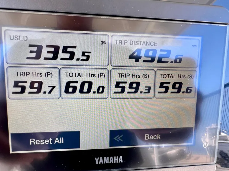 Slide: The Image of Display screen showing fuel usage and trip data for a 2023 Sailfish 272 CC boat. - 9